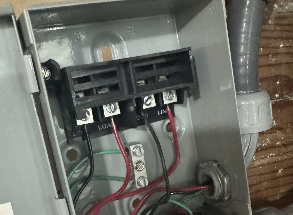 Outdoor AC electrical disconnect box with wiring