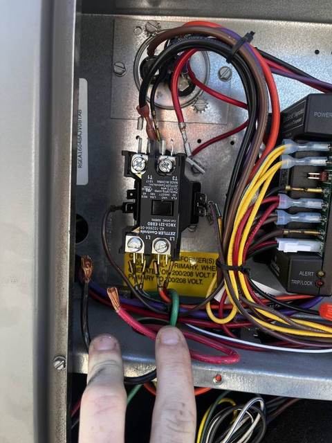 New contactor installed in an AC unit's electrical panel