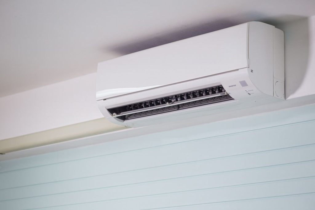 Ductless mini-split indoor unit mounted high on a wall