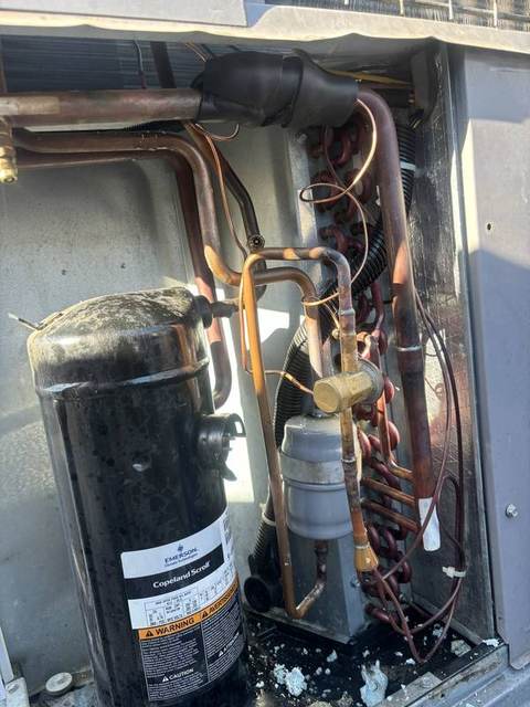 New expansion valve and filter drier brazed into a rooftop AC unit